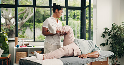 Buy stock photo Woman, physiotherapist or exercise with patient leg for muscle recovery, mobility or rehabilitation. Female person, physiotherapy or help with joint movement for health, motion training or stretching