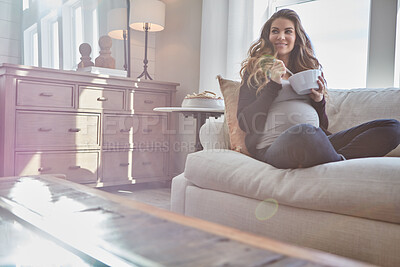 Buy stock photo Thinking, pregnant woman and eating food with smile at house for pregnancy cravings in lounge. Happy, person and healthy meal for nutrition, maternal appetite and breakfast diet for fetal development