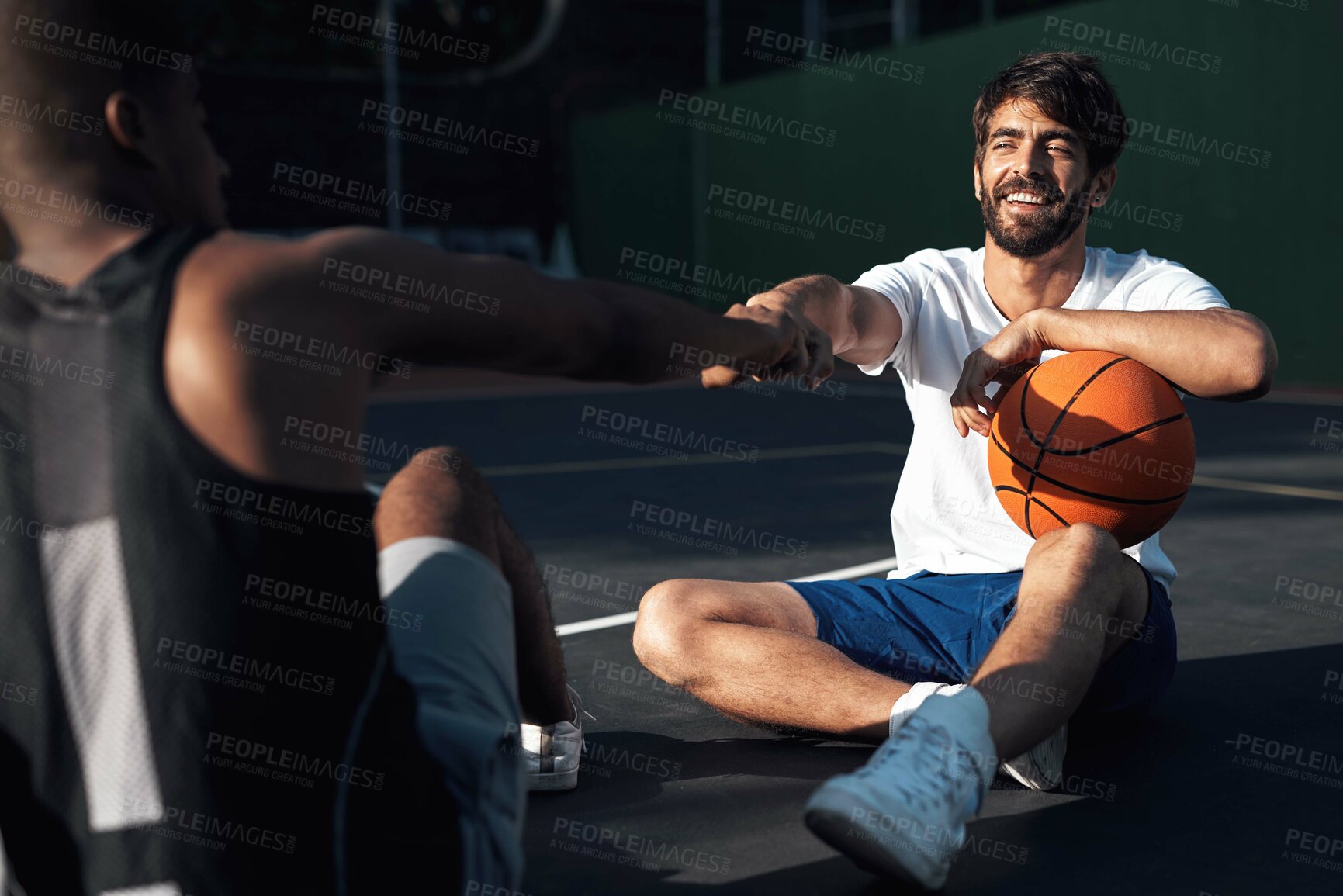 Buy stock photo Smile, support and fist bump with men on basketball court for trust, sports athlete and team. Competition solidarity, partner and training goal with friends outdoor for synergy, game and respect