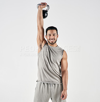 Buy stock photo Athlete, man and happy with kettlebell in studio for power training, functional exercise and health. Portrait, person or weight workout on white background for muscle strength, weightlifting or space