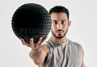 Buy stock photo Fitness, hand and man with medicine ball in studio for exercise routine, weightlifting or wellness. Portrait, athlete and weight equipment on white background for power workout, health and practice