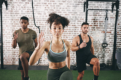 Buy stock photo Portrait, class and high knees with woman in gym for cardio challenge, workout team and health. Coaching, training partner and wellness with group in sports center for personal trainer and exercise