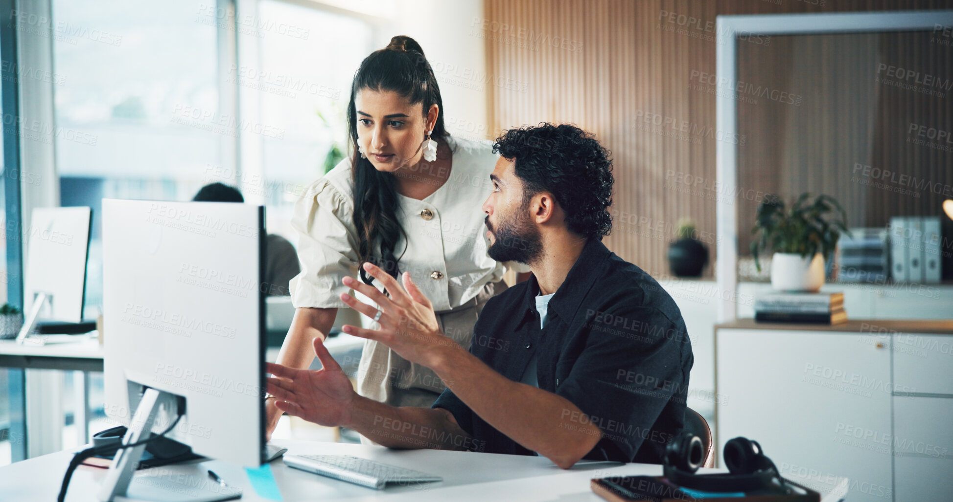 Buy stock photo Man, woman and discussion with computer in office for insight, advice and review at media company. People, writer and editor with pc, planning or perspective for feedback with article at press agency