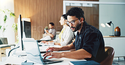 Buy stock photo Creative, typing and man with computer, office and planning for magazine publication and journalism. Media, reporter and person with tech for story, coworking and blog post on website in newsroom