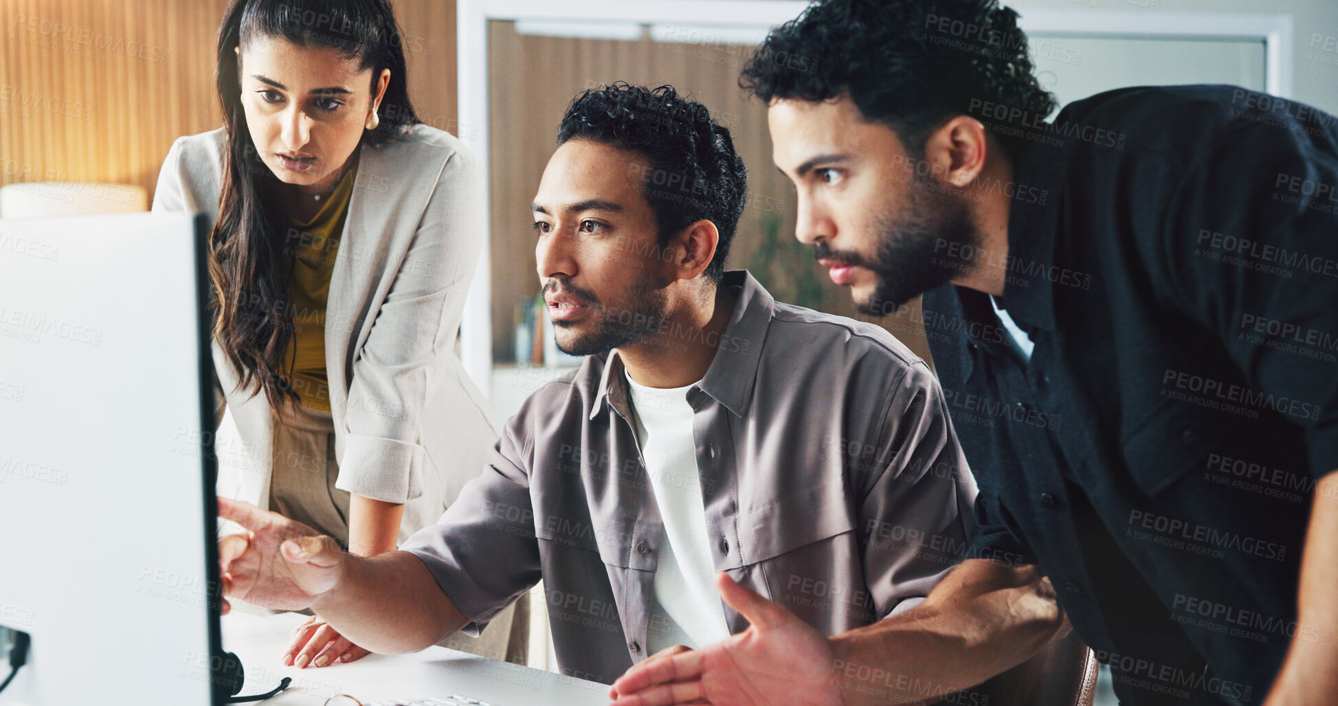 Buy stock photo Man, team and computer with insight at office for project management, talk and point at media company. People, group and feedback with pc, collaboration and discussion with article at press agency