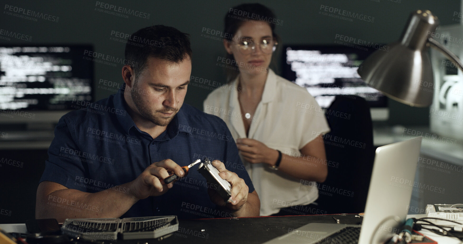 Buy stock photo Hard drive, repairs and technician with manager in office for maintenance, upgrade or fixing server. Laptop, equipment and male engineer building switch board with electric database in workplace.