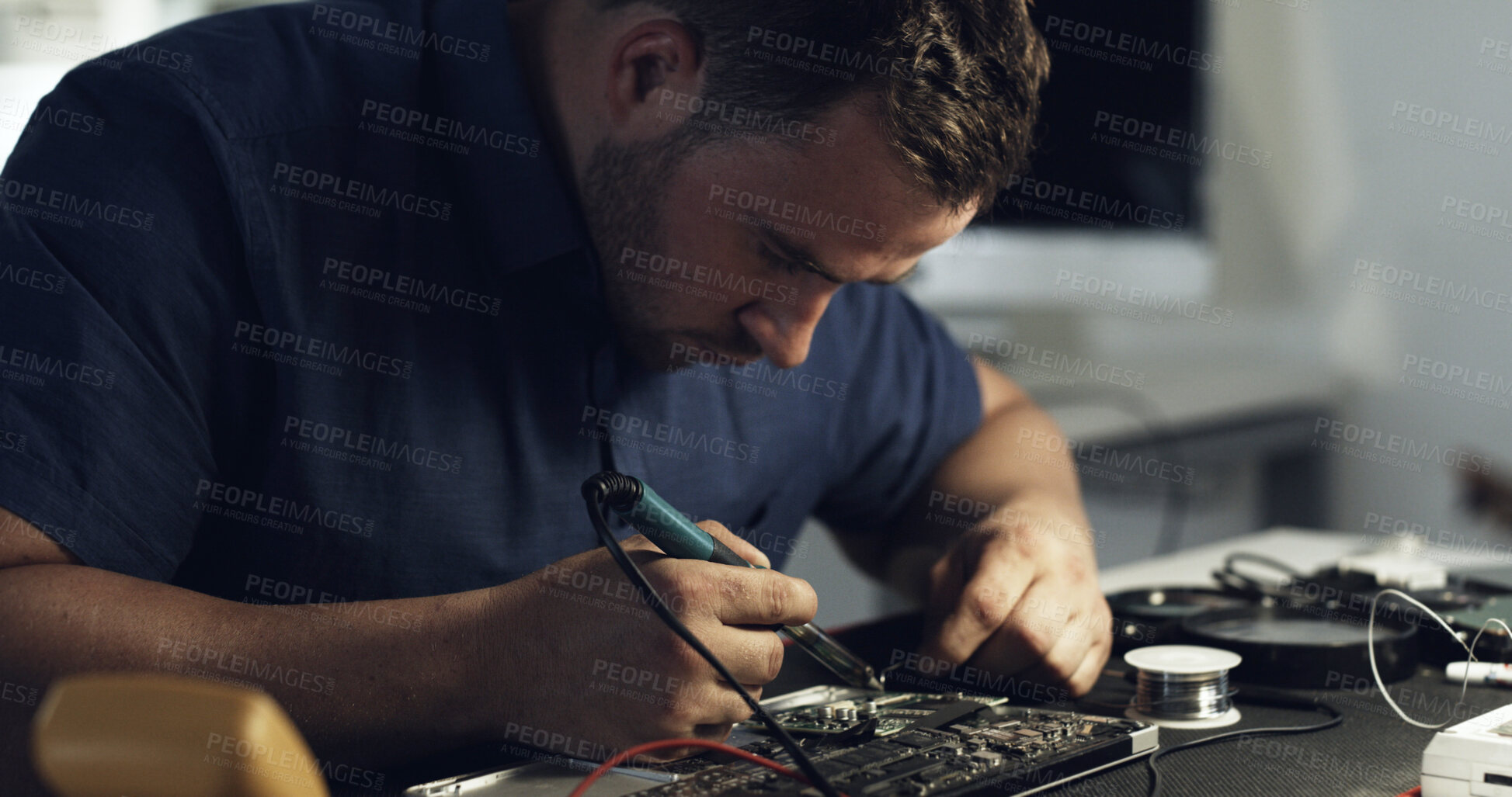 Buy stock photo Soldering, repair or man in workshop with circuit board, inspection or wiring assemble in hardware check. Electronics, tech or engineer with motherboard, restoration tool or maintenance in system fix
