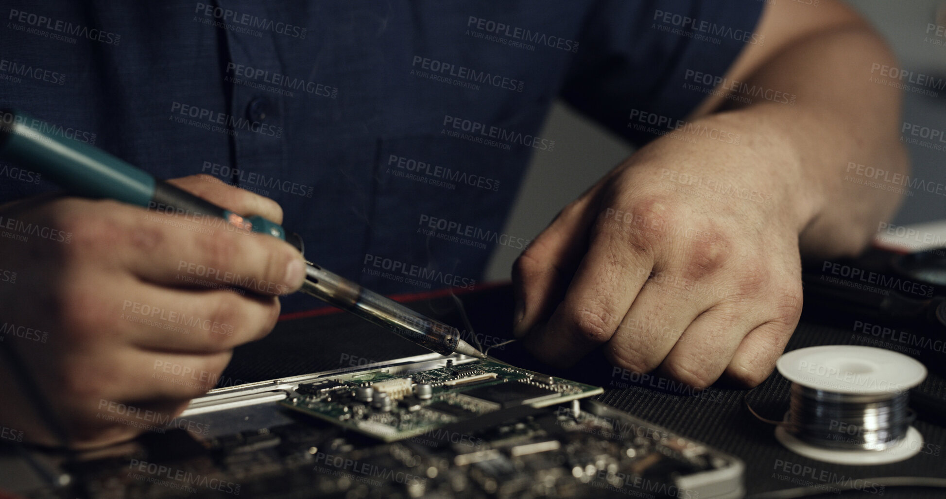 Buy stock photo Soldering, fix or hands in workshop with motherboard, inspection or wiring assemble in hardware check. Electronics, person or engineer with tech, circuit board testing or maintenance in system repair