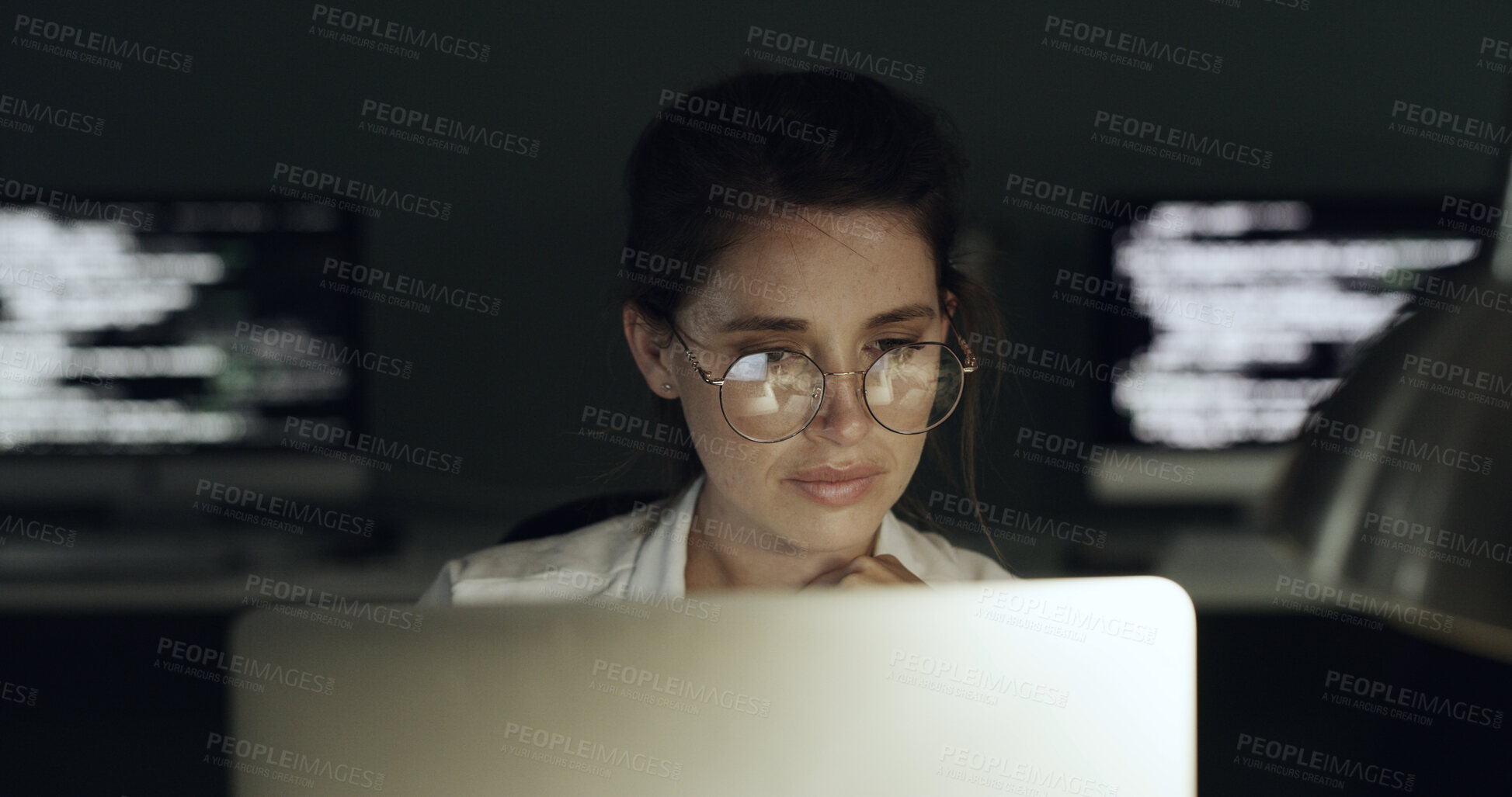 Buy stock photo Glasses, reading and business woman with laptop for programming, software or web design solution. Programmer, reflection and technology for IT problem solving, maintenance results or coding at night