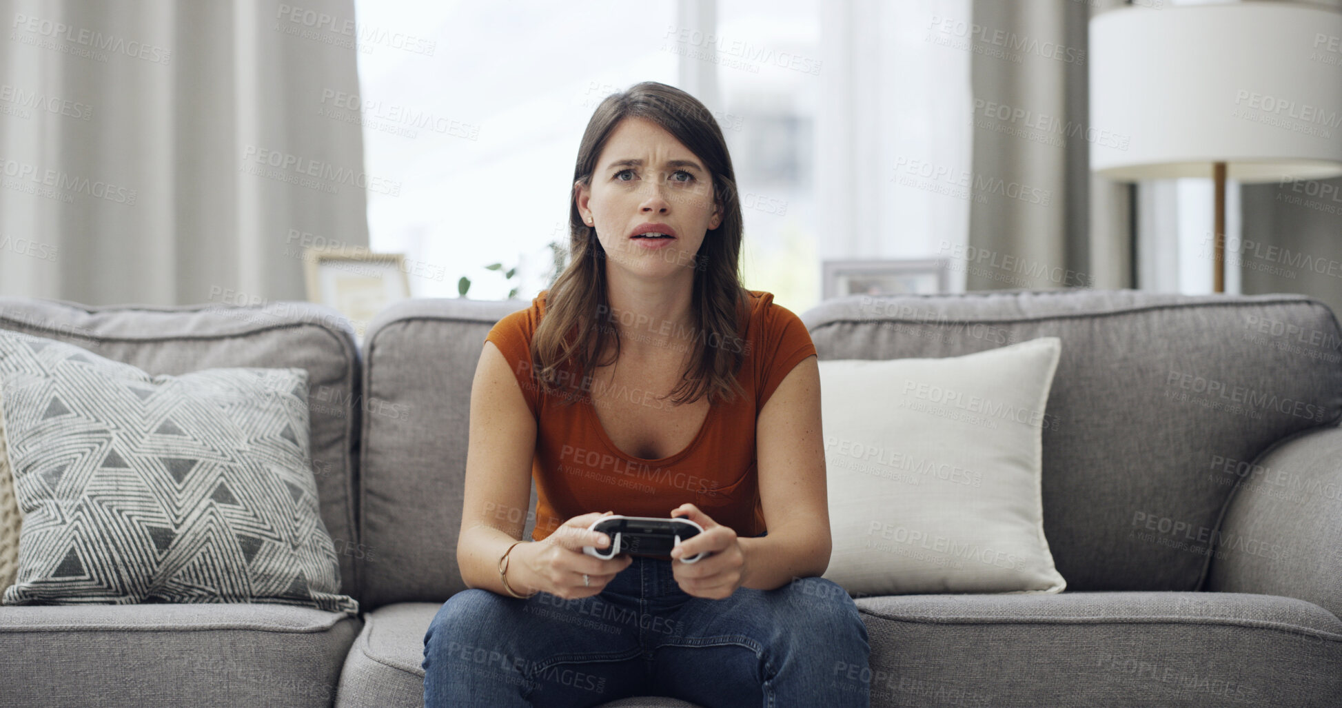 Buy stock photo Frustrated, woman or gamer with controller on sofa for serious competition or match in home. Female person, user or playing on console remote or couch for gaming entertainment or online subscription