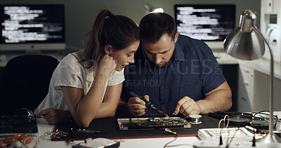 Buy stock photo Night, motherboard and team with welding for IT maintenance, repair and diagnostics for hardware. Technology, technician and engineer people with tools for troubleshooting, system test or soldering