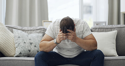 Buy stock photo Home, emotional and man with stress on couch, exhausted and thinking of financial pressure in lounge. Unemployment, reflection and person with depression on sofa, mental health and anxiety for debt