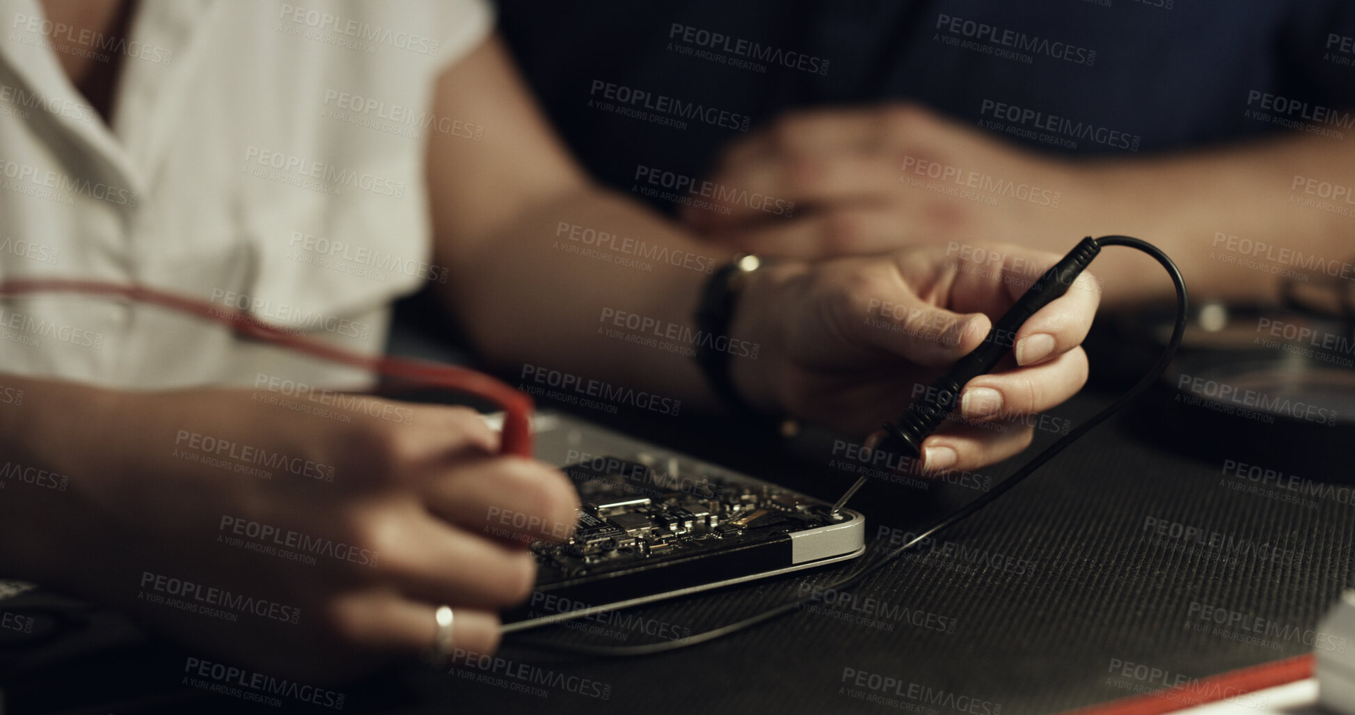 Buy stock photo Soldering, team or hands in workshop with circuit board, guidance or wiring repair in hardware check. Electronics, people or engineers with tech, testing advice or collaboration in system fix.