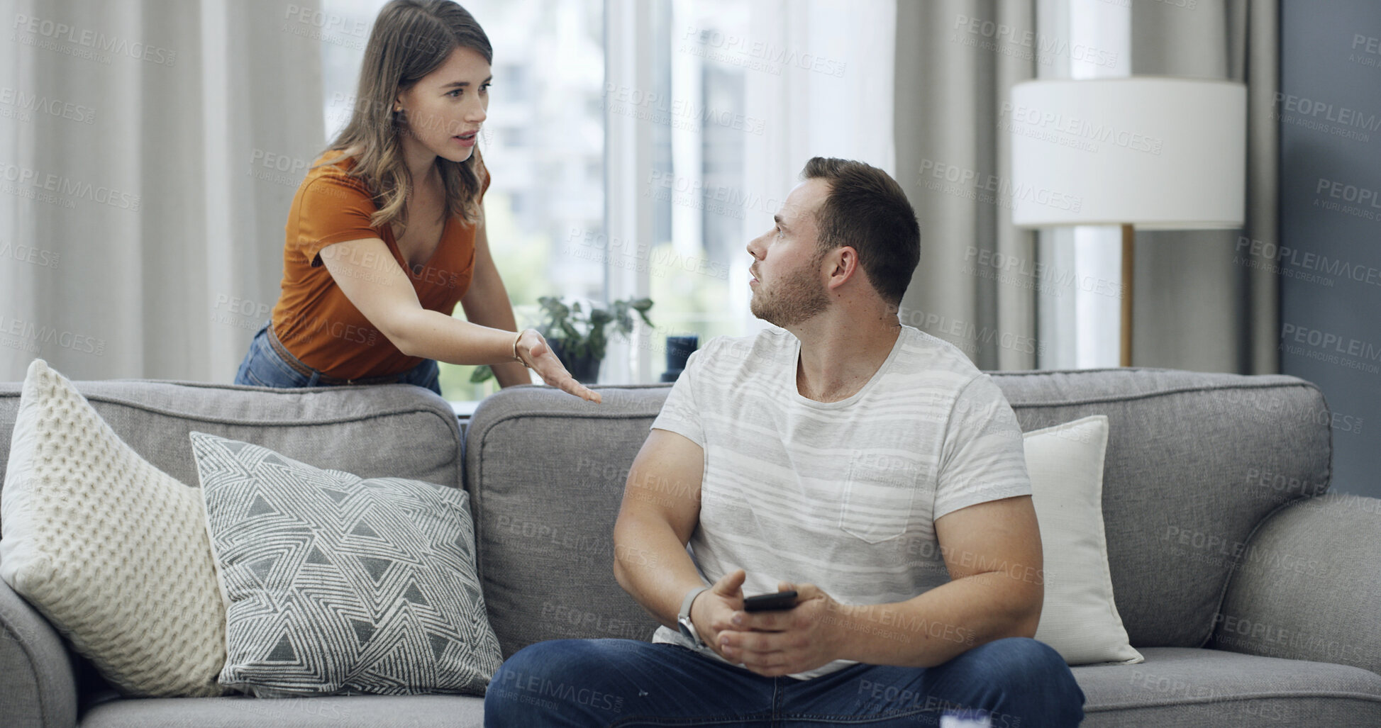 Buy stock photo Argument, phone and people on sofa in home with relationship problem, cheating or affair conflict. Fighting, cellphone and man with woman for marriage disagreement in living room at apartment.