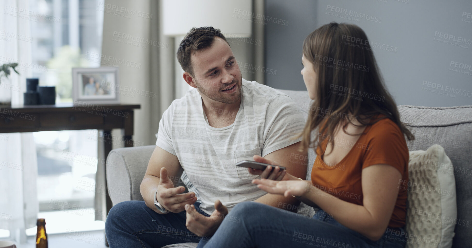 Buy stock photo Argument, phone and couple on couch in home, trust issues  or online infidelity for cheating dispute. Relationship problem, mobile or people with fight in apartment, betrayal disagreement or conflict