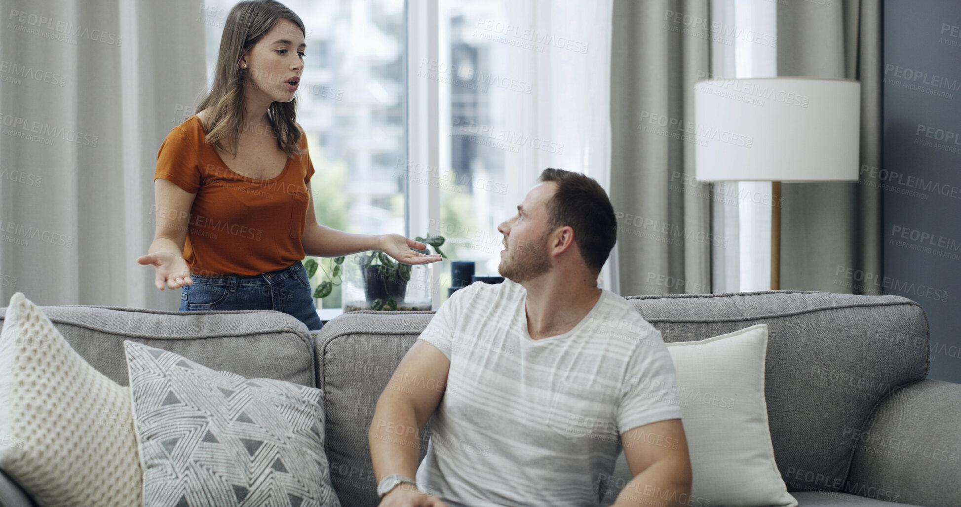 Buy stock photo Argument, angry and couple on sofa in home with relationship problem, cheating or affair conflict. Fighting, conversation and man with woman for marriage disagreement in living room at apartment.