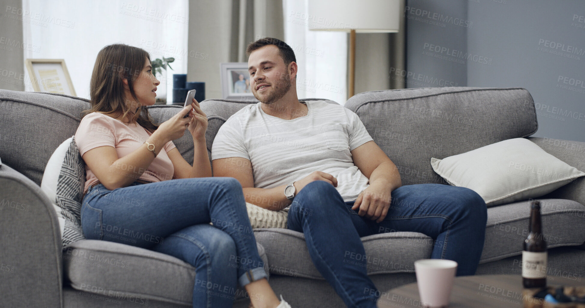 Buy stock photo Couple, secret and confession with phone for cheating affair, toxic relationship or privacy in home. Man, woman or spying with mobile smartphone for separation, trust issue or conflict in house