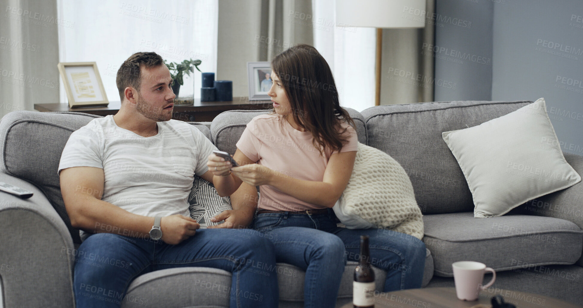 Buy stock photo Argument, cellphone and couple on sofa in home with relationship problem, cheating or affair conflict. Fighting, phone and man with woman for marriage disagreement in living room at apartment.