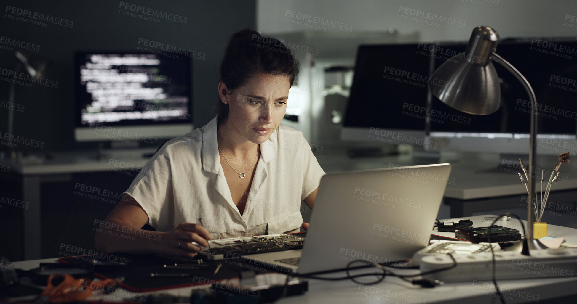 Buy stock photo Tool, motherboard and woman with laptop repair in office for diagnostic solution, hardware test and IT. Tech, technician and install CPU at night for troubleshooting, trace signal and problem solving