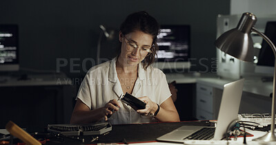 Buy stock photo Night, laptop and woman with hard drive for IT maintenance, repair and diagnostics for software. Technology, technician and engineer person with tools for troubleshooting, system test or programming