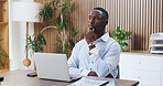Laptop, thinking and black man in office with insight, problem solving or funding ideas for budget pitch. Review, firm or financial consultant with tech, online report or proposal plan for investment