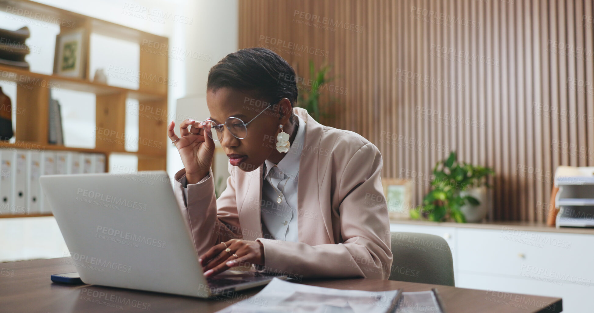 Buy stock photo Online, glasses and black woman with laptop, office or risk management with financial report on web. Auditor, eyewear and person with tech for revenue review, reading and analysis for tax return