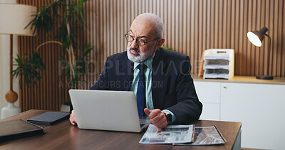 Buy stock photo Reading, glasses and businessman with laptop, office and mature attorney with legal research on web. Corporate, lawyer and person with eyewear in law firm, serious and case review with technology