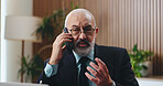 Discussion, phone call and businessman in office with insight, problem solving or funding ideas for budget pitch. Mature, financial consultant or firm with tech for report, proposal or investment