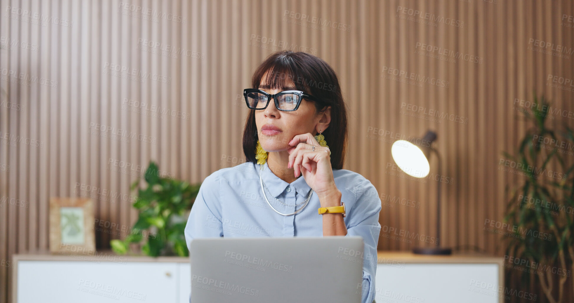 Buy stock photo Office, glasses and mature woman with laptop, thinking and ideas for assignment and risk management. Reflection, auditor and person with technology for revenue review, eyewear and wonder in business