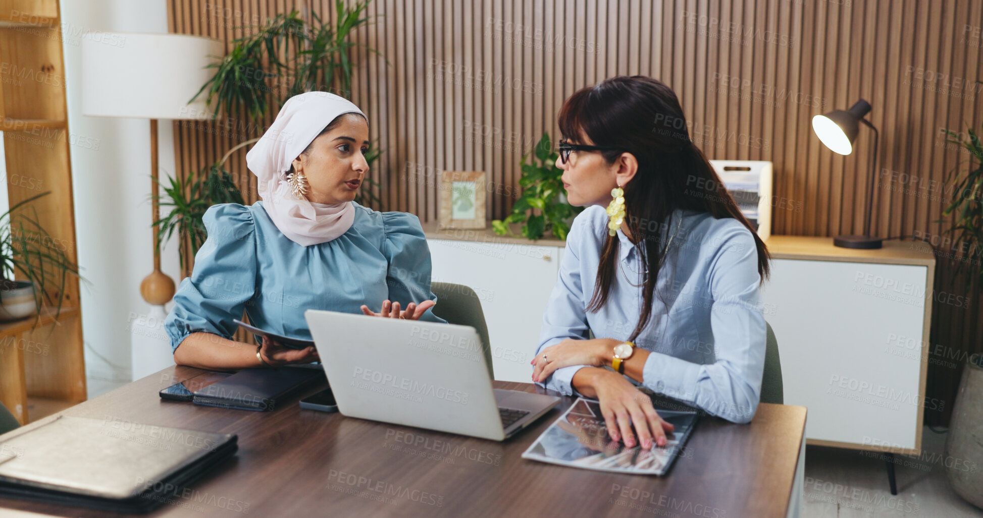 Buy stock photo Woman, laptop and documents with team in office meeting for strategy, admin or insight at insurance company. Person, broker and listen with tech on application, feedback or risk management at agency