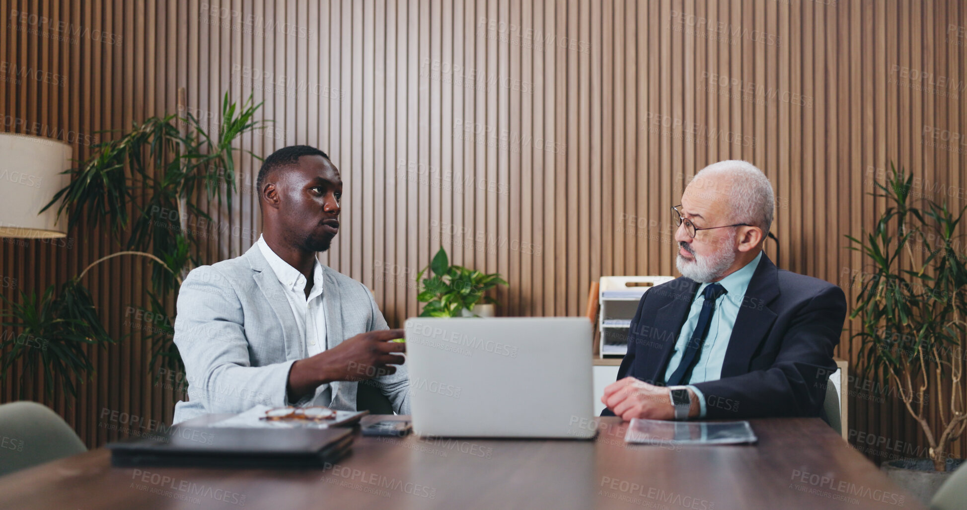 Buy stock photo Businessman, laptop and discussion with team in office for meeting, mentor or strategy at insurance company. People, broker and talk with computer for solution, feedback or risk management at agency