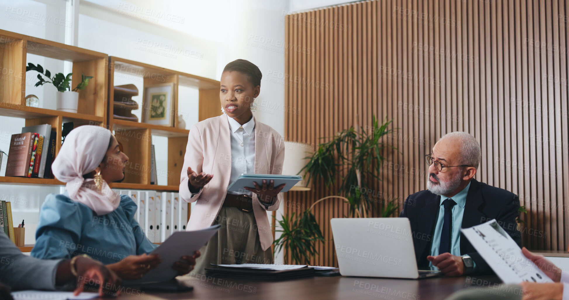 Buy stock photo Woman, tablet and speaker with team in office meeting for planning with review, insight or talk at insurance company. Person, broker and group with tech on app, feedback or risk management at agency