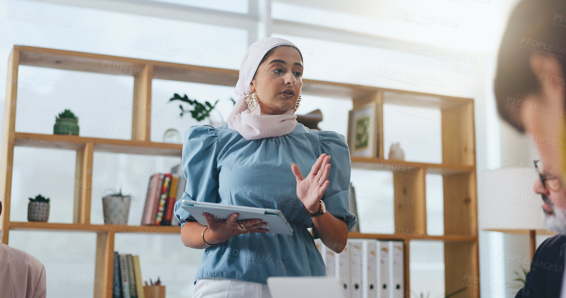 Buy stock photo Woman, tablet and planning with team in office meeting on app with review, insight or talk at insurance company. Person, speaker and tech for group, feedback or risk management report at agency