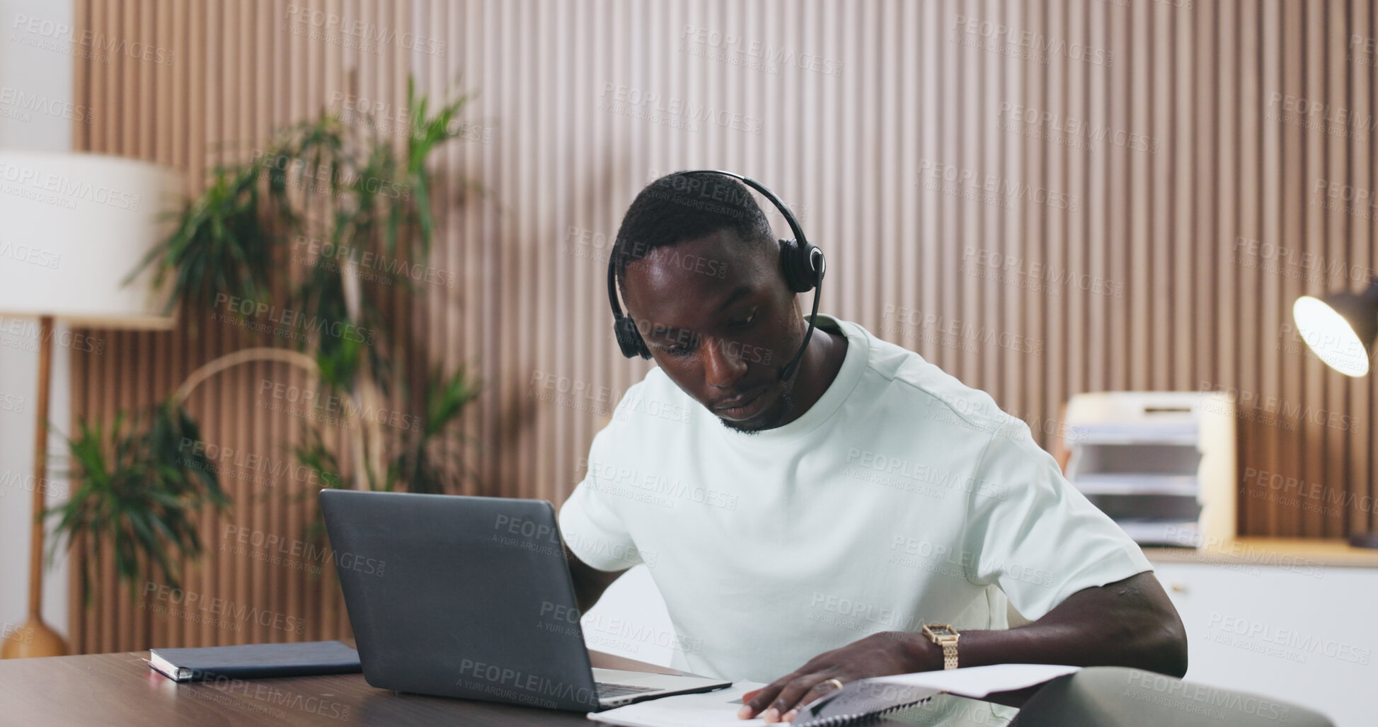Buy stock photo Black man, laptop and documents at office with headset for technical support, review and contact us at IT company, African person, developer and voip with paperwork, feedback and project at agency