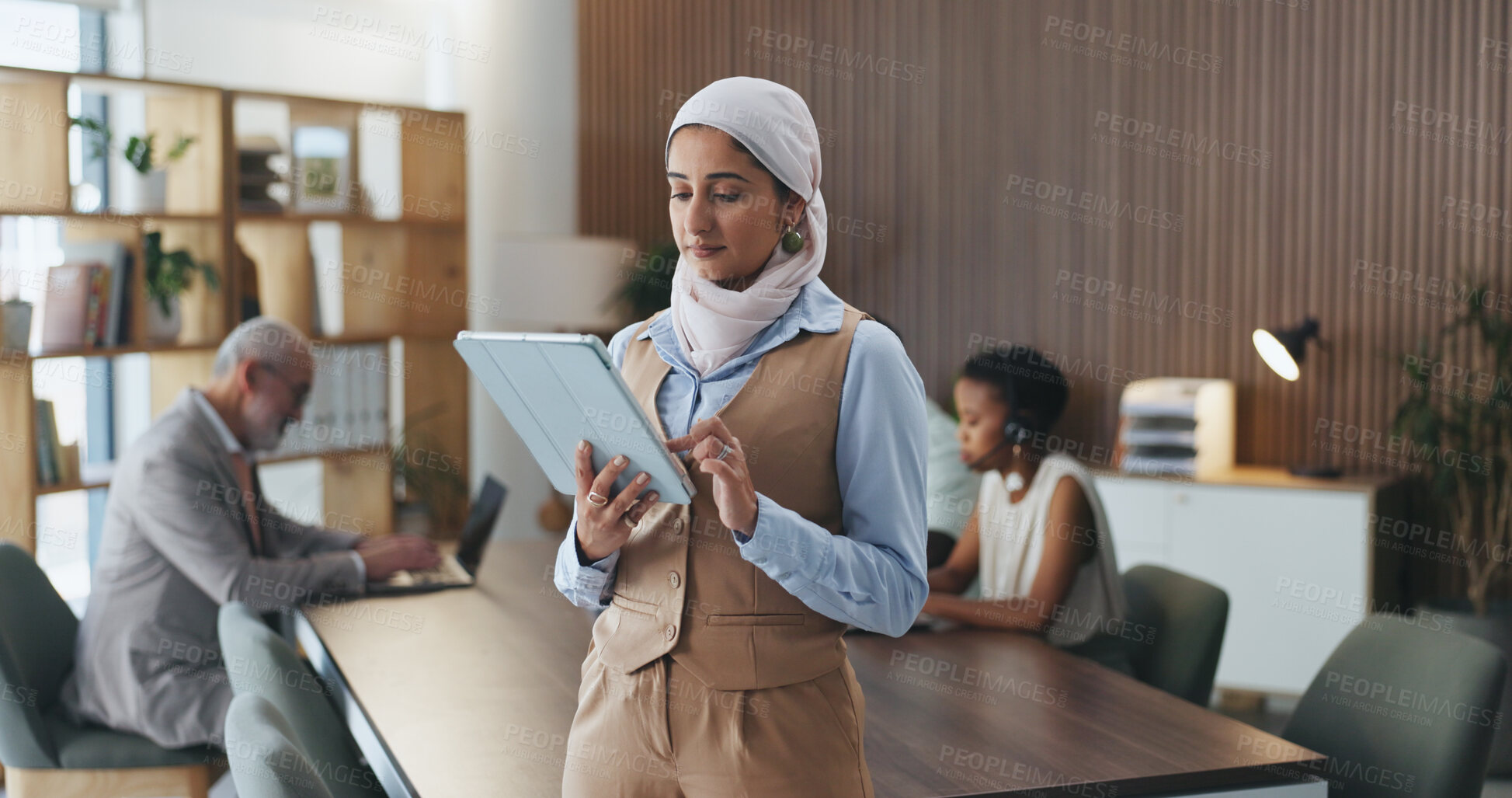 Buy stock photo Muslim, businesswoman and scroll with tablet, reading and campaign review on web or online in office. Browsing, media coverage and Islamic person with tech, serious or pr account manager with project