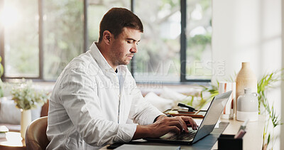 Buy stock photo Remote work, laptop and businessman in home for budget review, planning and finance report. Consultant, house and person on computer for research, online proposal and website for financial advisor