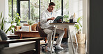 Remote work, tablet and business man in home for planning, budget review and finance report. Consultant, house and person on tech for research, online proposal and website for financial advice