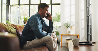 Buy stock photo Phone call, smile and man on sofa in home with communication, contact or networking in living room. Cellphone, relax and male person on mobile conversation for gossip or connection in apartment.