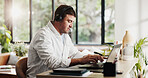 Remote work, laptop and man in home with headphones for planning, budget review and finance report. Consultant, house and person on computer for financial proposal, research and website with music