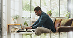 Typing, remote work and man with laptop in home for account manager, client portfolio and research. Admin, feedback and networking with person in living room for planning or thinking in house
