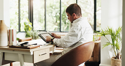 Buy stock photo Remote work, tablet and man in home for finance report, budget review and planning for financial advice. Consultant, house and person on tech for research, online proposal or website for business