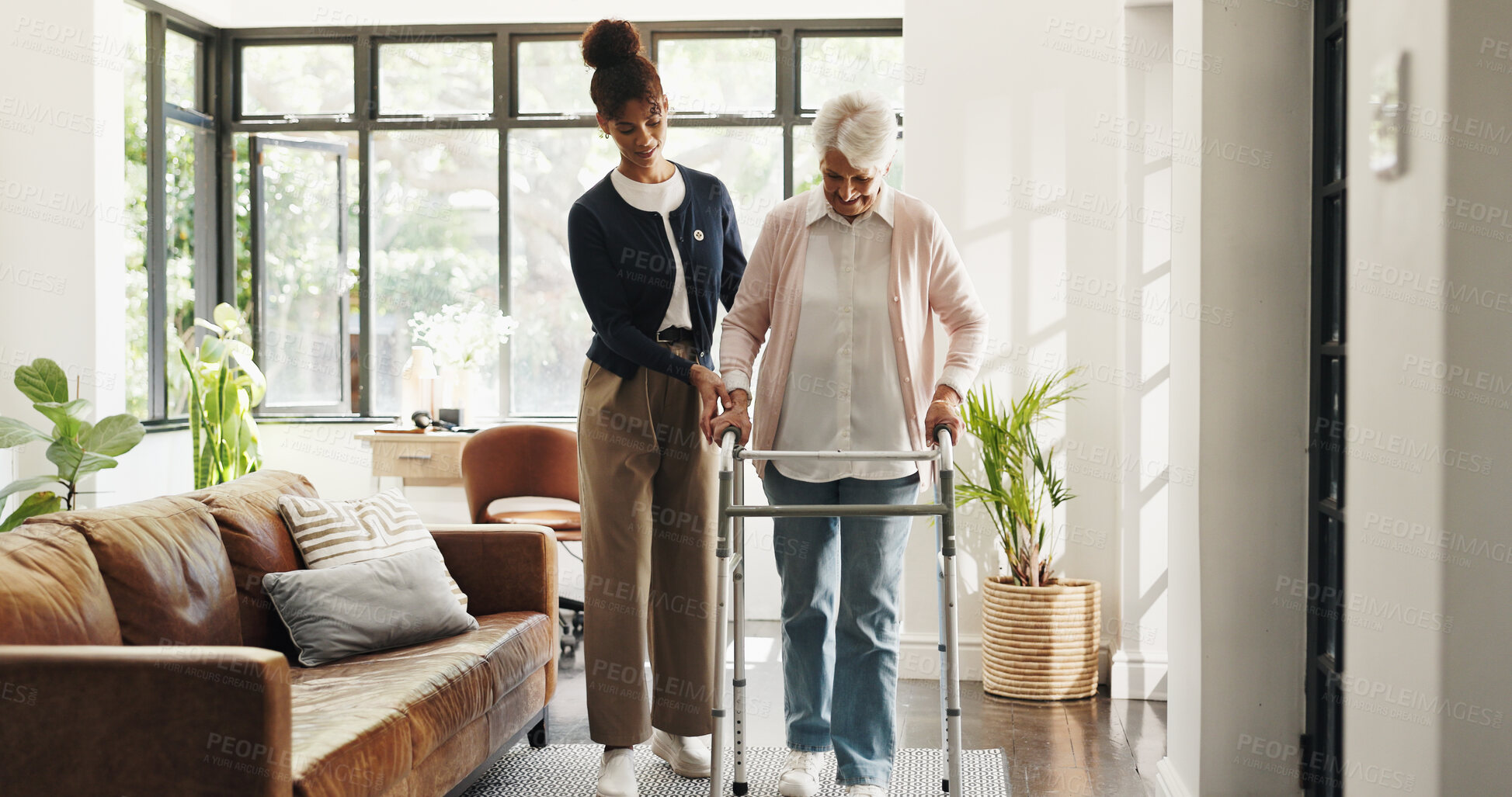 Buy stock photo Nurse, old woman and help with walker in home for mobility, balance and support in retirement. Patient, caregiver and elderly person with disability, frame or rehabilitation for healing in house