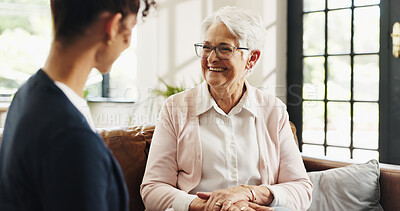 Buy stock photo Chat, volunteer and senior woman in living room for rehabilitation, checkup and post surgery recovery. Apartment, elderly pensioner and caretaker in home for support, conversation and advice for help