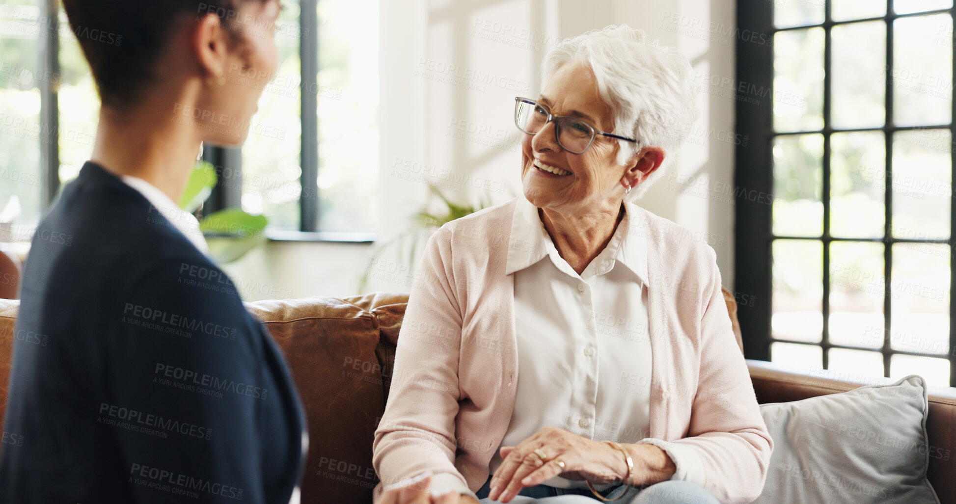 Buy stock photo Support, volunteer and senior woman in home for rehabilitation, checkup and post surgery recovery. Apartment, elderly pensioner and caretaker in living room for conversation, chat and advice for help