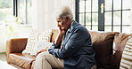 Old woman, sad and thinking on sofa in home with reflection, memory or trauma in living room. Elderly person with depression, mental health and grief on couch in lounge with retirement at house