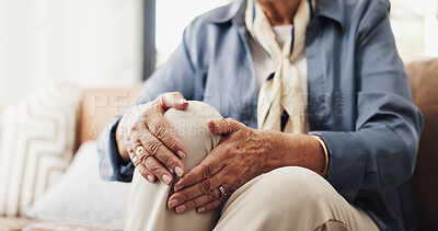 Buy stock photo Hands, knee pain and injury in couch in home with fatigue, arthritis and muscle sprain in retirement. Elderly person, joint ache and fibromyalgia with inflammation on sofa in living room at house