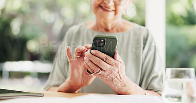 Buy stock photo Phone, reading and hands with senior woman in home for social media, relax and online. App, connection and wellness with person in apartment for internet search, text message and typing in retirement