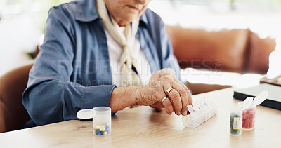 Buy stock photo Hands, pills and container for schedule in home with prescription drugs, wellness and retirement. Elderly person, bottle and pharmaceutical product with reminder, organizer and supplements in house