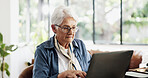 Old woman, laptop and typing in home with review for finance, budget or glasses in living room. Elderly person, computer and documents with notes, asset management or insurance in retirement at house