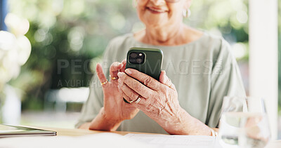 Buy stock photo Phone, typing and smile with senior woman in home for social media, reading and online. App, connection and wellness with person in apartment for internet search, text message and relax in retirement